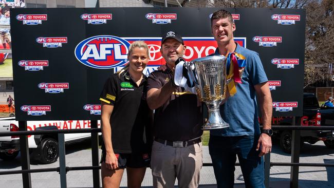 Katie Brennan, Justin Cleary and Jonathan Brown with the Premiership Cup Picture: Supplied