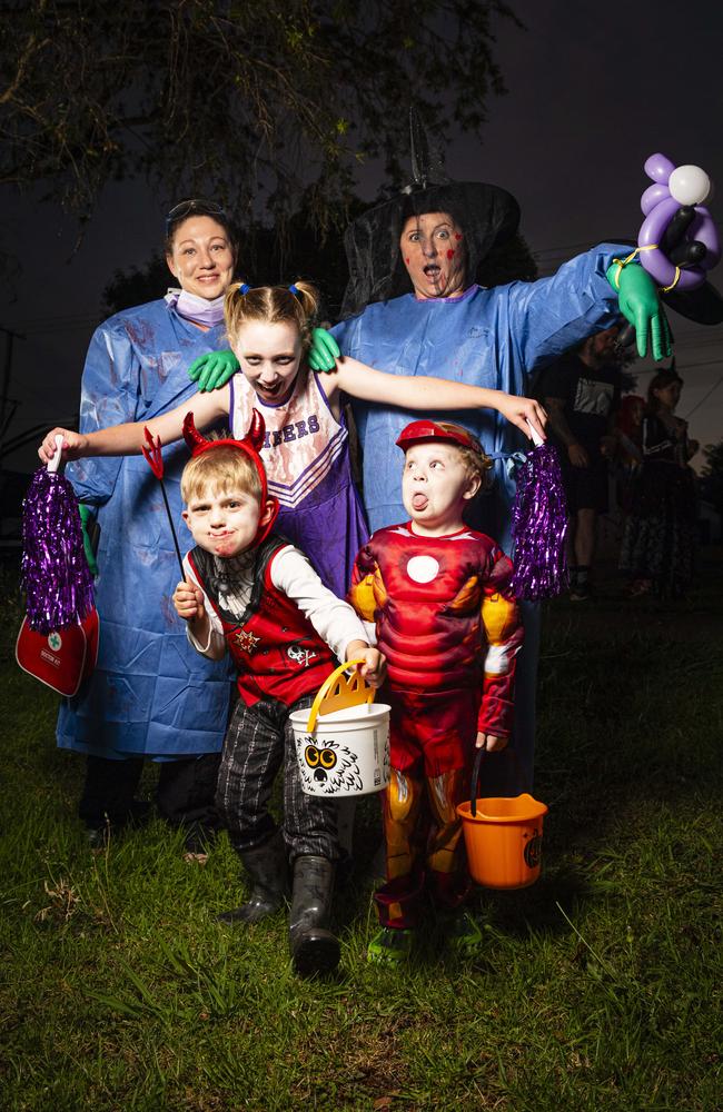 Andrea Warren (left) and Theresa Murray with kids Angus, Charlotte and Isaac trick or treating on Halloween, Thursday, October 31, 2024. Picture: Kevin Farmer