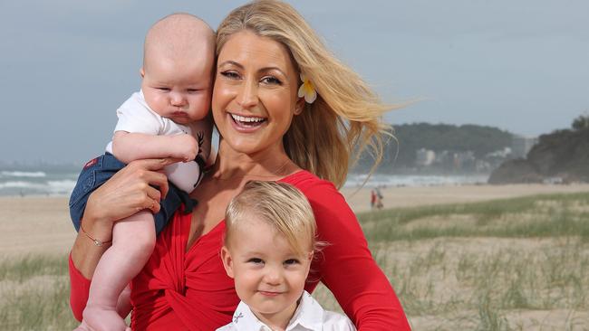 Channel 7 personality Liz Cantor with Kit, 2, and Fin, three months, at Miami on the Gold Coast. Picture Glenn Hampson