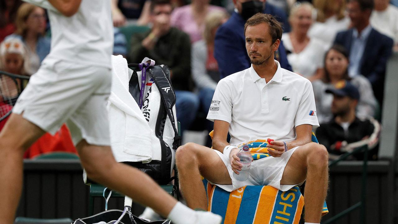 Russia's Daniil Medvedev playing at Wimbledon in 2021. Photo by Adrian DENNIS / AFP.