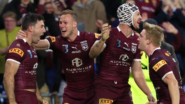 Ben Hunt scores during game 3, the decider, of the State of Origin series between Queensland and New South Wales at Suncorp Stadium. Pics Adam Head