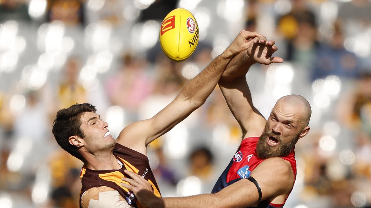 MELBOURNE, AUSTRALIA - MARCH 23: Ned Reeves of the Hawks competes with Max Gawn of the Demons during the round two AFL match between Hawthorn Hawks and Melbourne Demons at Melbourne Cricket Ground, on March 23, 2024, in Melbourne, Australia. (Photo by Darrian Traynor/Getty Images)