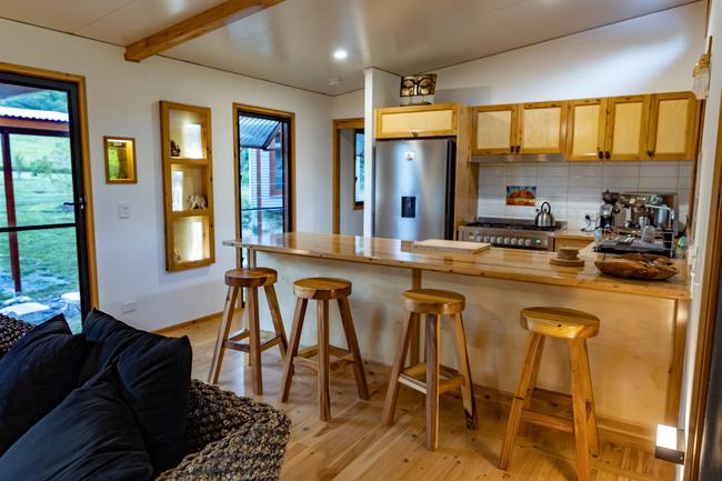 The Mount Jukes Eco Resort, built from scratch by yoga aficionado David Deakin, holds glamping tents and a half-moon shaped house that face Mt Jukes and Mr Deakin says the â€œenergyâ€ of the property has to be experienced to be understood. Picture: Contributed