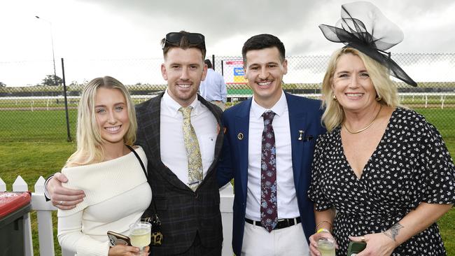 The Ladbrokes 2024 Moe Cup is held at Moe Horse Racing Club, Moe Victoria, Friday 18th October 2024. Racegoers Ivy, Baley, Jake, Andrea enjoying the races.Picture: Andrew Batsch