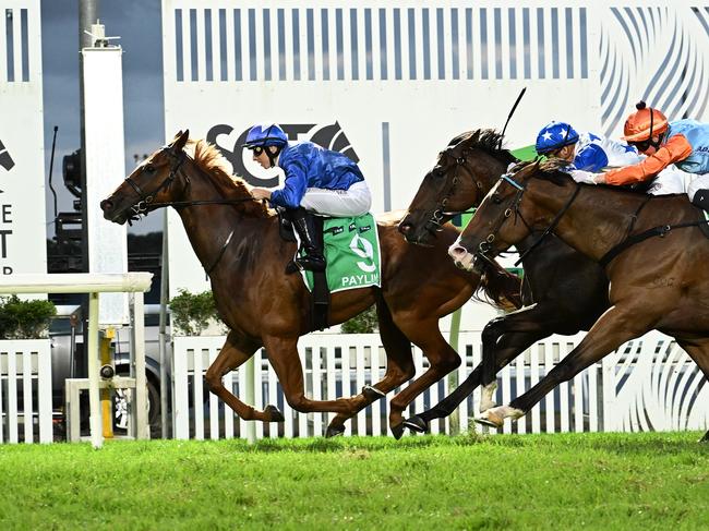 Payline launches from last to win The Syndicate for jockey Damian Lane and trainers Chris and Corey Munce. Picture: Grant Peters / Trackside Photography