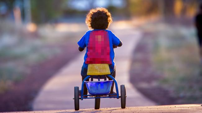 Toddler “Matty” on his tricycle. A spotlight has fallen on the child protection system in the NT.