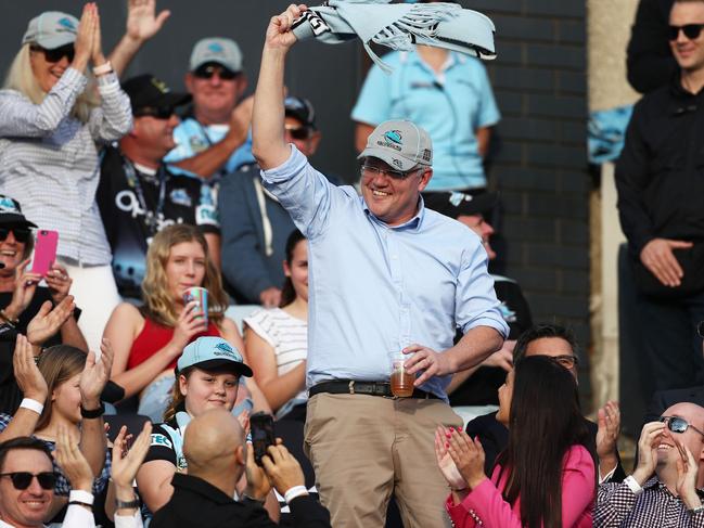 Savouring victory... The PM waves to the crowd at Shark Park yesterday. Picture: Getty