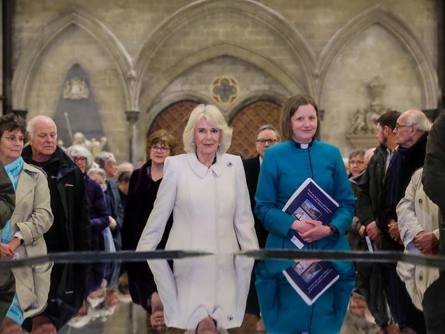 Queen Camilla takes a moment of reflection at The Salisbury font, designed by British water sculptor William Pye during a musical evening at Salisbury Cathedral. Picture: Getty Images