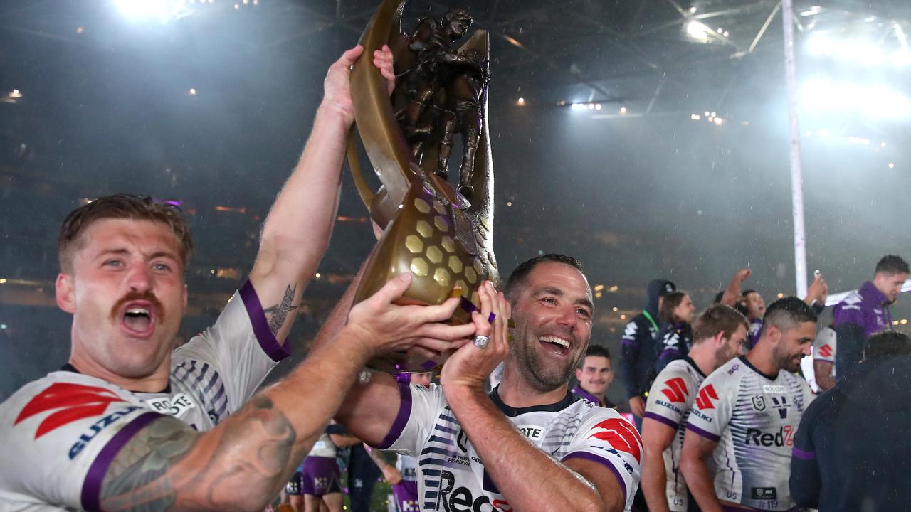Cameron Munster and Cameron Smith celebrate winning the 2020 premiership. Picture: Getty