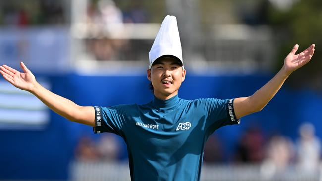 Min Woo Lee interacts with the crowd wearing a chef’s hat on the ‘Party Hole’at the Australian PGA Championship at Royal Queensland Golf Club Picture: Getty Images