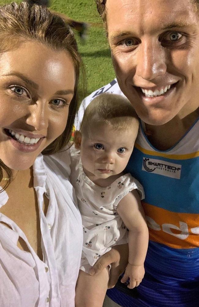 Gold Coast Titans star Jarrod Wallace with wife Courtney and their daughter Kennedy. Photo: Supplied.