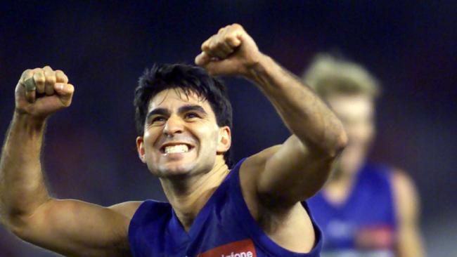 Jose Romero soaks up Western Bulldogs’ upset win, which sealed a finals berth.