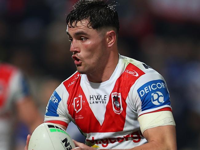 SYDNEY, AUSTRALIA - AUGUST 10: Kyle Flanagan of the Dragons runs the ball during the round 23 NRL match between St George Illawarra Dragons and Canterbury Bulldogs at Netstrata Jubilee Stadium, on August 10, 2024, in Sydney, Australia. (Photo by Jeremy Ng/Getty Images)