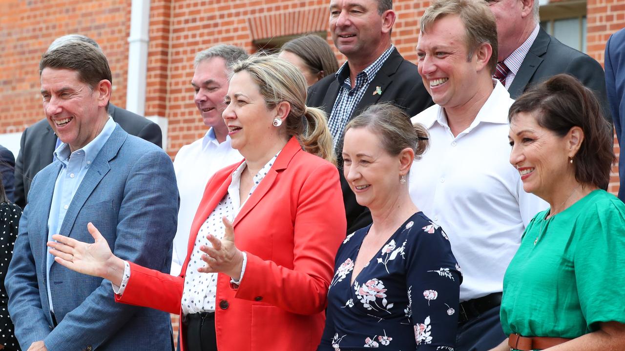 Premier Annastacia Palaszczuk and state cabinet ministers pose for photos on the steps of city hall at Maryborough on Monday. Picture: Lachie Millard