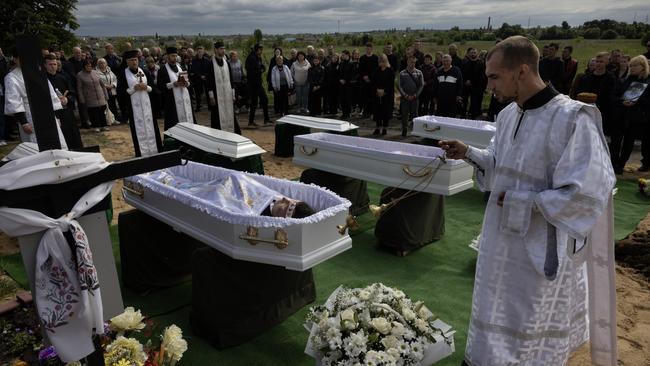 A funeral on Wednesday for children killed in Russia’s aerial attack on several cities in Ukraine last weekend. Picture: Getty Images