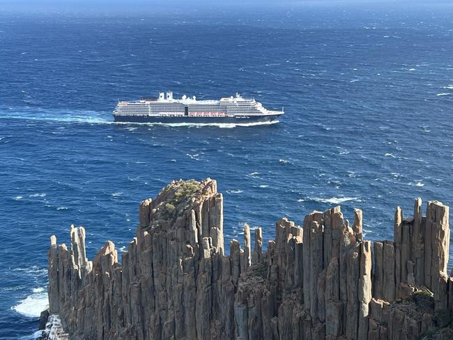 A cruise ship sails past Cape Roaul on the Tasman Peninsula. Picture: Philip Young