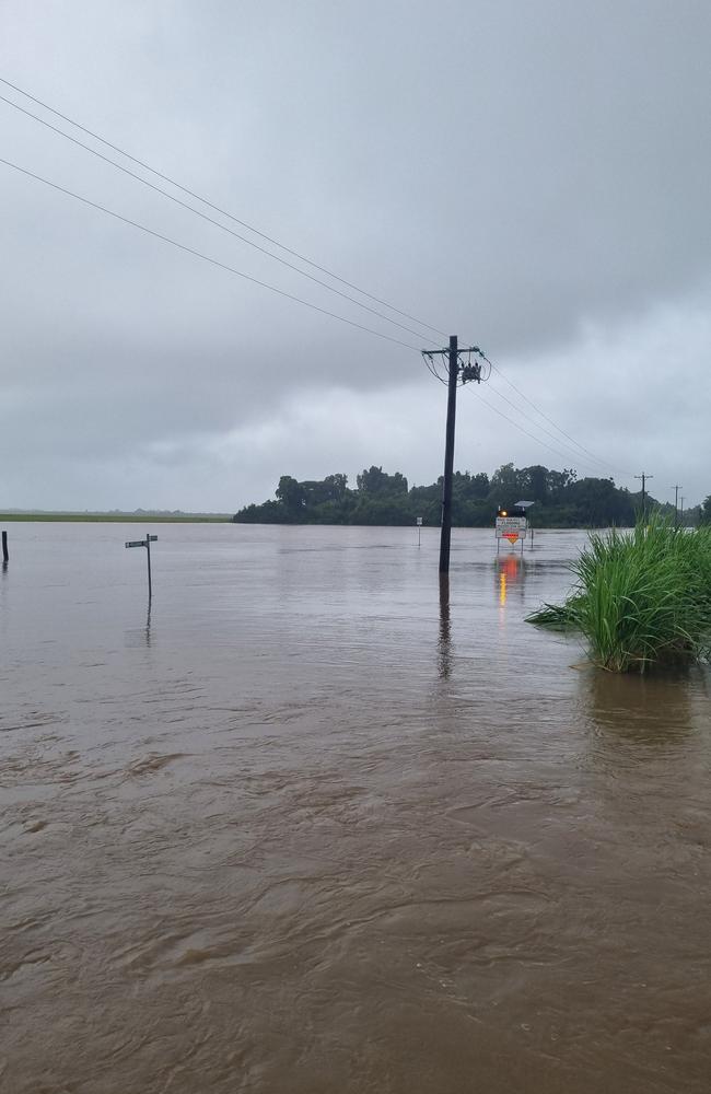 Pictures of flooded on Musgrave Street on the Ingham approach to the town of Halifax during the peak of the flooding early this month. Picture: Coral Gard