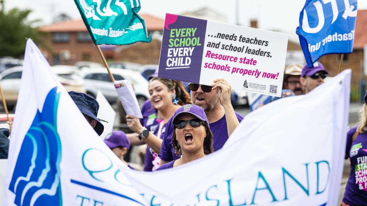 Angela Keenan chants while marching with QTU members during Labour Day 2022 Toowoomba march, Saturday, April 30, 2022. Picture: Kevin Farmer