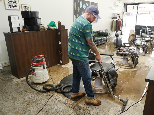 Businesses in Lilydale clean up after a local storm. Picture: NCA NewsWire / David Crosling