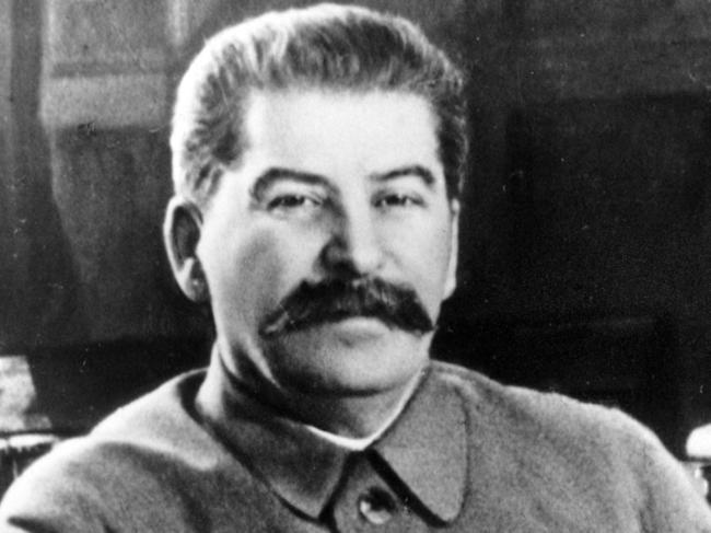 Josef Stalin, secretary-general of the Communist Party of the Soviet Union and premier of the Soviet state, poses at his desk in the Kremlin, Moscow, in an election photo issued in 02/1950.