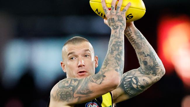 MELBOURNE, AUSTRALIA – AUG 03: Dustin Martin of the Tigers marks the ball during the 2024 AFL Round 21 match between the North Melbourne Kangaroos and the Richmond Tigers at Marvel Stadium on August 03, 2024 in Melbourne, Australia. (Photo by Dylan Burns/AFL Photos via Getty Images)