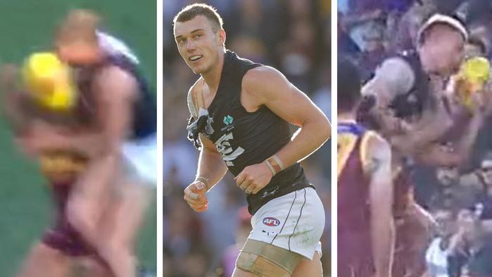 Patrick Cripps elected to make contact mid-air with Lion Callum Ah Chee.