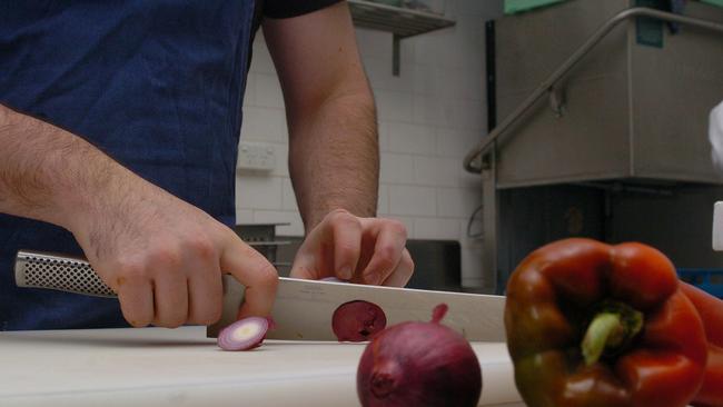 Cooking Head Chef readies some veggies. Generic (TO BE USED ONLY FOR EDITORIAL)