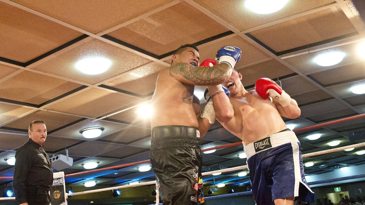 Paul Gallen and Herman Ene-Purcell fight it out in Toowoomba. Friday, Jan 29, 2016.