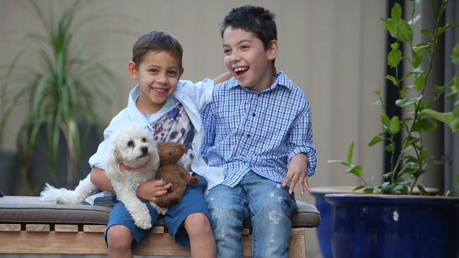 Last year’s National Child of Courage winner Calyn Hoad, 9, with brother Kya, 6. Picture: Jamie Hanson