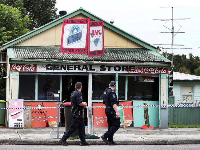 Police pictured at Wyong General Store where shop owner Steven Van Meeteren was stabbed. Picture: Sue Graham