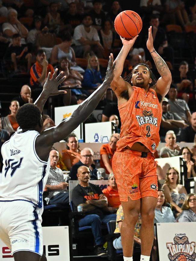 CAIRNS, AUSTRALIA - SEPTEMBER 28: Rob Edwards of the Taipans shoots a three during the round two NBL match between Cairns Taipans and Adelaide 36ers at Cairns Convention Centre, on September 28, 2024, in Cairns, Australia. (Photo by Emily Barker/Getty Images)