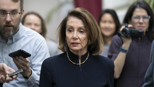 Speaker of the House Nancy Pelosi, D-Calif., walks with reporters to a Democratic Caucus meeting the morning after President Donald Trump's State of the Union speech, on Capitol Hill in Washington, Wednesday, Feb. 6, 2019. (AP Photo/J. Scott Applewhite)