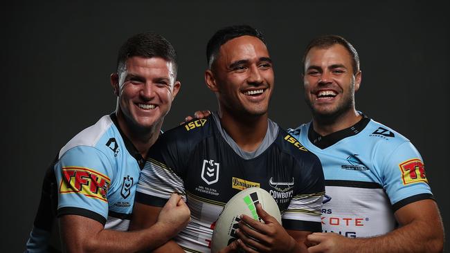 Best of enemies: Sharks stars Chad Townsend (L) and Wade Graham (R) catch up with former teammate Val Holmes (C). Picture: Brett Costello