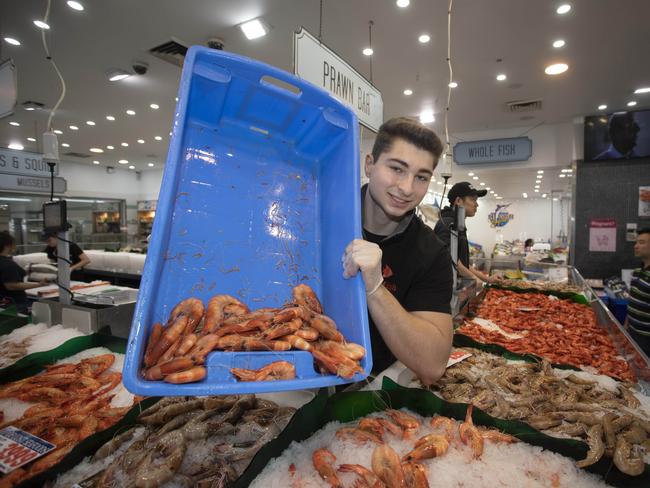 Mr Muollo with some prawns. Picture: Quentin Jones.