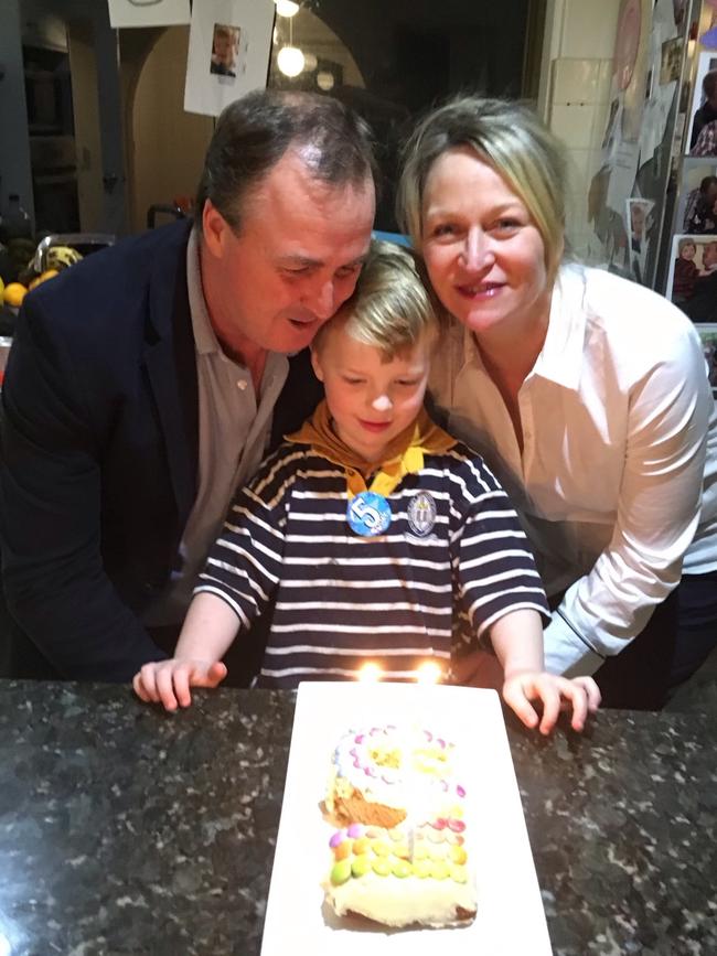 Tim Watson and partner Holly Myers with her son Huck. Picture supplied by family