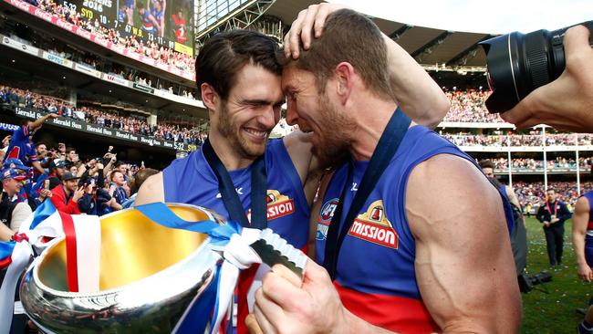 Easton Wood and Matthew Boyd celebrate the 2016 grand final win. Picture: Adam Trafford/AFL Media/Getty Images