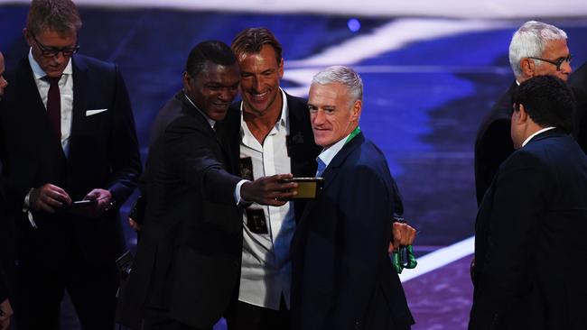 Marcel Desailly (L), Herve Renard, Manager of Morocco (middle) and Didier Deschamps, Manager of France (R) takes a selfie