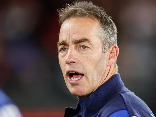 MELBOURNE, AUSTRALIA - MAY 19: Alastair Clarkson, Senior Coach of the Kangaroos addresses his players during the 2024 AFL Round 10 match between the Essendon Bombers and the North Melbourne Kangaroos at Marvel Stadium on May 19, 2024 in Melbourne, Australia. (Photo by Dylan Burns/AFL Photos via Getty Images)