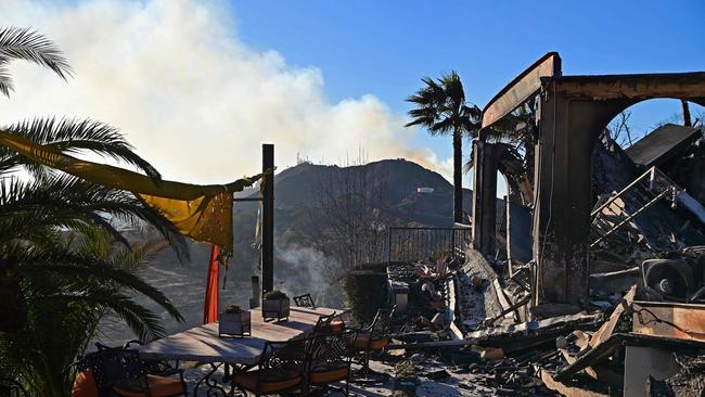 Barely damaged patio furniture lies in the rubble of a house destroyed by the Palisades Fire, near Saddle Peak, in the Santa Monica Mountains between Malibu and Calabasas, California. Picture: AFP