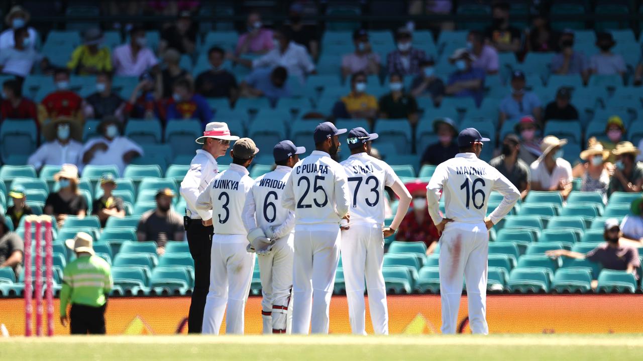 Indian players look towards a section of the crowd where an alleged racial comment was directed towards Siraj. Picture: Getty Images