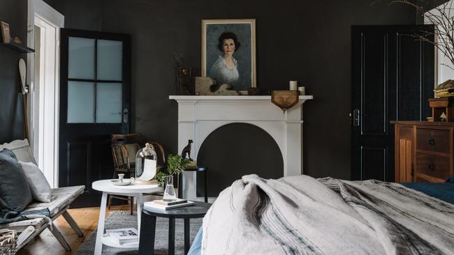 One of the bedrooms at The Ship Inn, in Stanley, featuring vintage art works and timeless furniture pieces. Picture: Marnie Hawson.