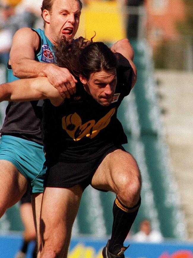 Mark Zanotti (WA) tussles with Billy Brownless (Allies) during a State of Origin game in Perth in 1995.