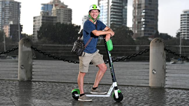 Paul Stringer from Sydney with a Lime scooter, which is being proposed for Norwest Business Park. (AAP image, John Gass)