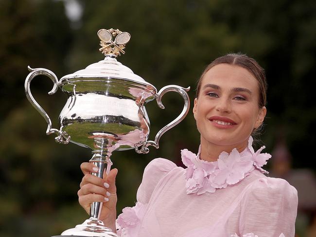 MELBOURNE, AUSTRALIA - JANUARY 29: Aryna Sabalenka poses with the Daphne Akhurst Memorial Cup after winning the 2023 Australian Open on January 29, 2023 in Melbourne, Australia. (Photo by Kelly Defina/Getty Images)