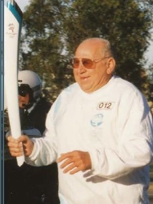 One of Norm Rule's proudest moments, carrying the Sydney Olympic torch.