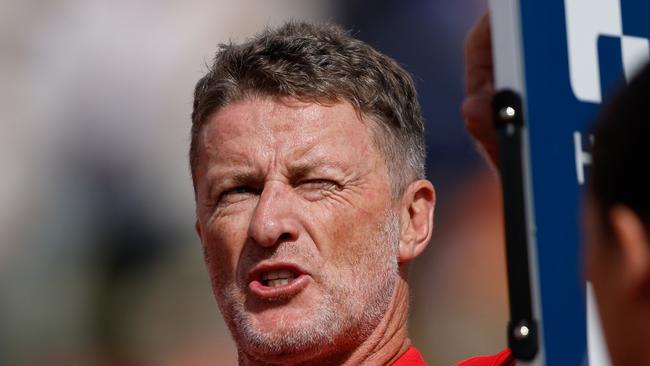 ADELAIDE, AUSTRALIA - APRIL 07: Damien Hardwick, Senior Coach of the Suns addresses his players at water time during the 2024 AFL Round 04 match between the Gold Coast SUNS and GWS GIANTS at Adelaide Hills - Mt Barker on April 07, 2024 in Adelaide, Australia. (Photo by Dylan Burns/AFL Photos via Getty Images)