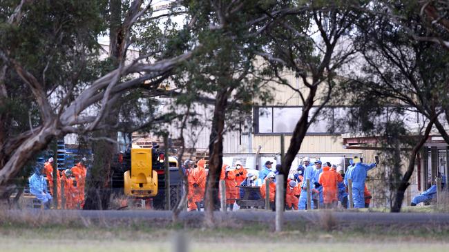 Meredith Chicken Farm. A team prepare to enter the chicken sheds. Picture: Mike Dugdale