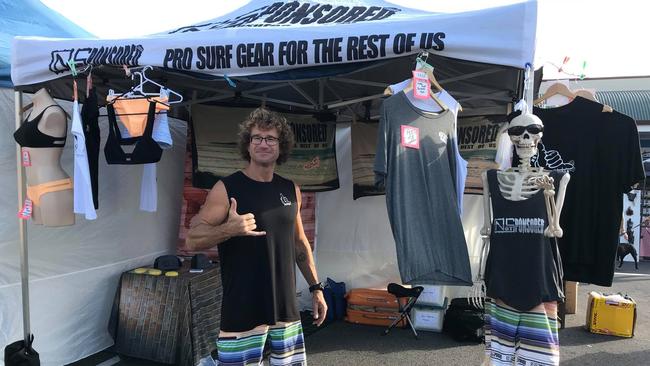 Brad Manuel with some of the Not Sponsored sustainable swimwear and beach items.