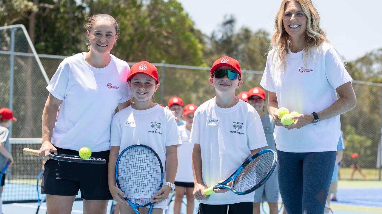 Australian tennis star Ash Barty and surfing champion Steph Gilmore with youngsters Sophia Kolovos and Xander Hicks at the Pottsville Tennis Club. Picture: Sophia Kolovos.