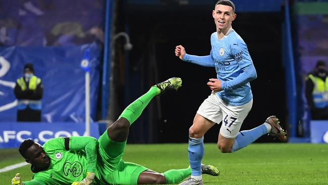 Manchester City’s Phil Foden celebrates scoring against Chelsea at Stamford Bridge